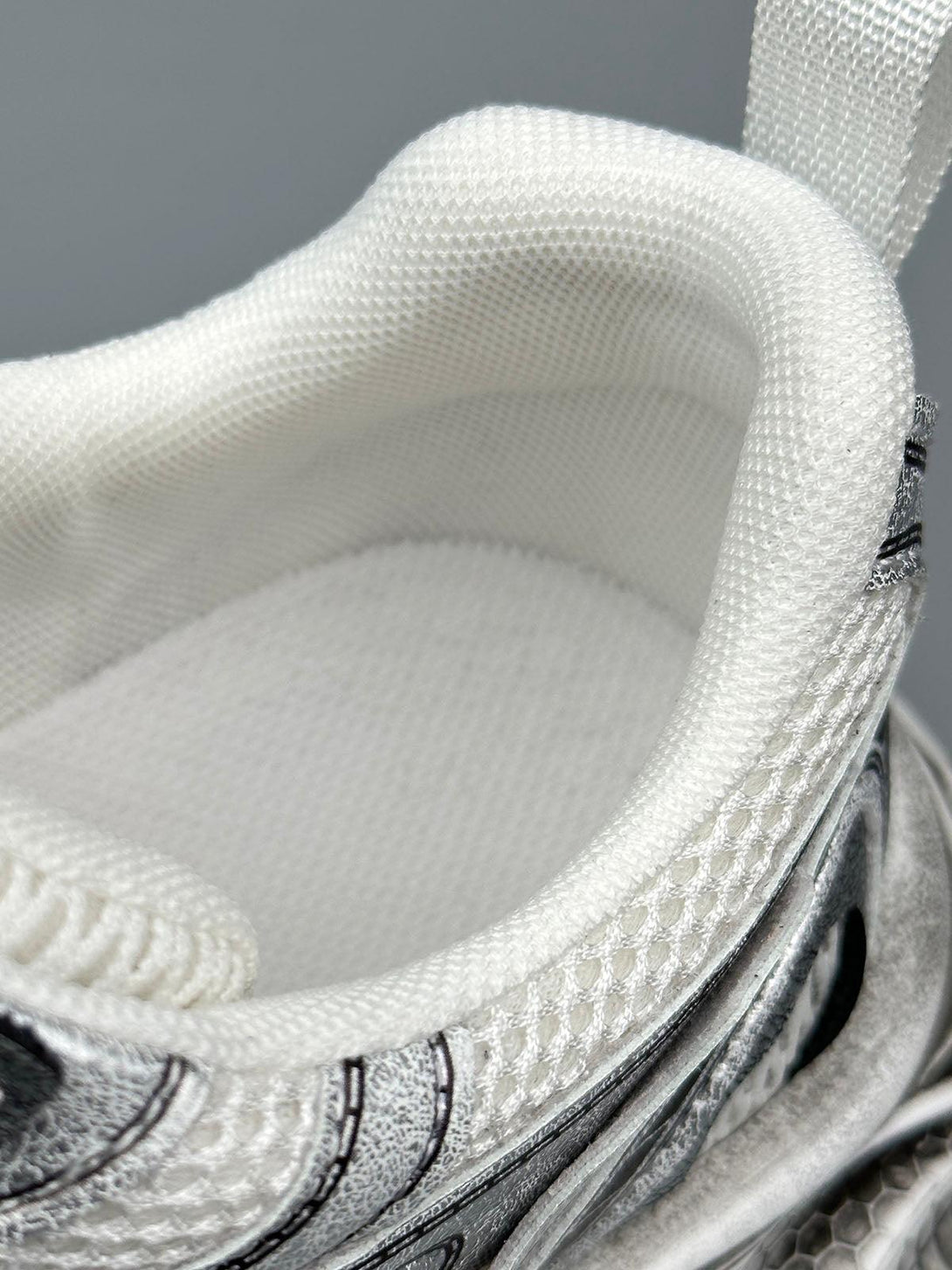Detailed view of TALISHKO chunky sole sneakers, focusing on breathable mesh texture.