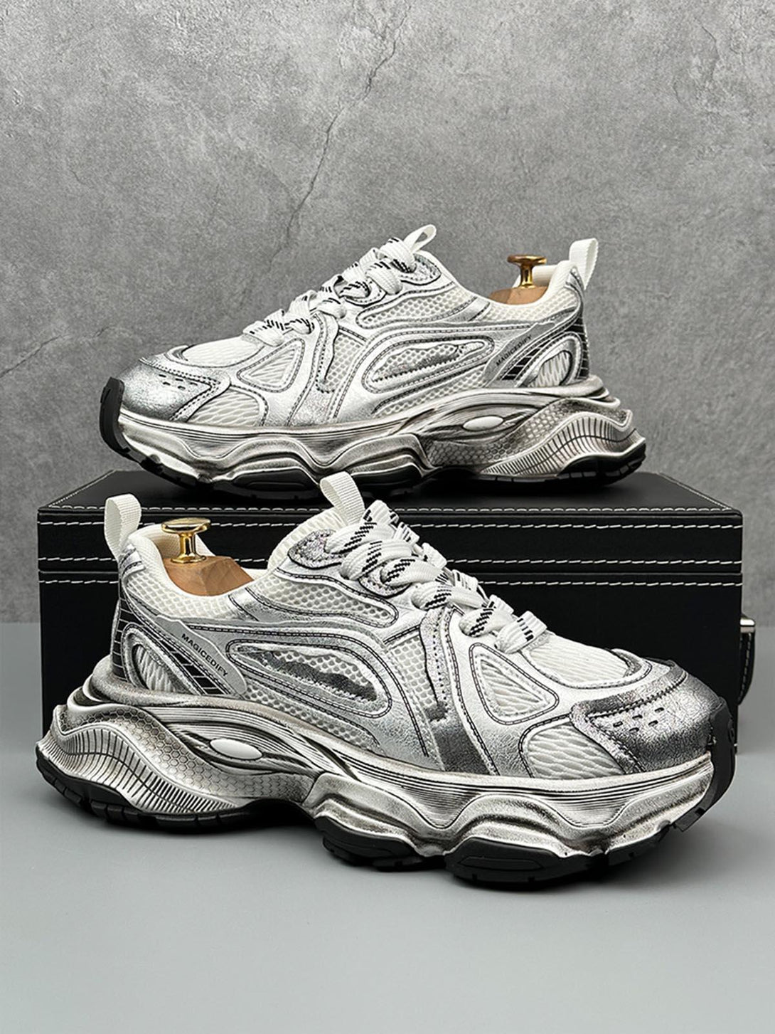 TALISHKO chunky sole sneakers in metallic, side view highlighting breathable mesh and bold design.