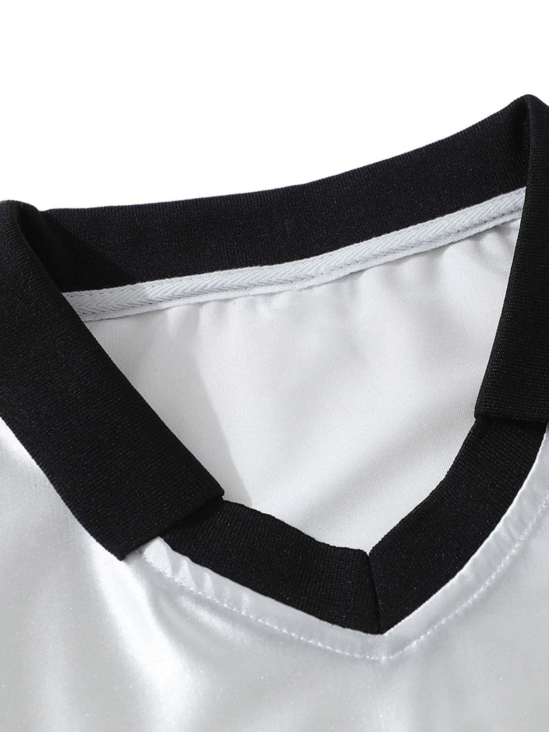 Detailed view of the neckline on a Classic Sports Jersey T-Shirt by TALISHKO, showcasing contrast trim.