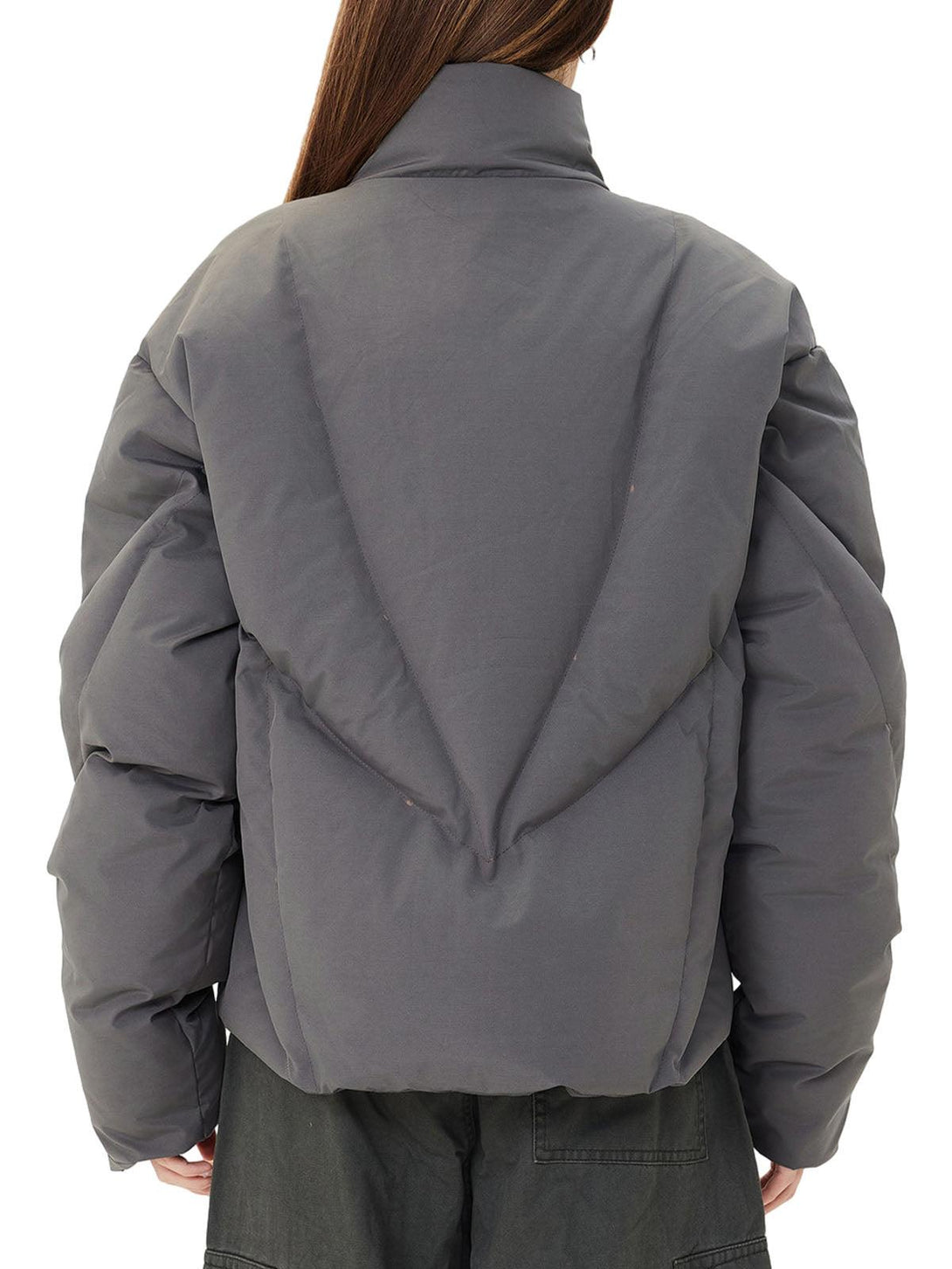Back view of a gray stand collar puffer jacket by TALISHKO, highlighting its voluminous design.