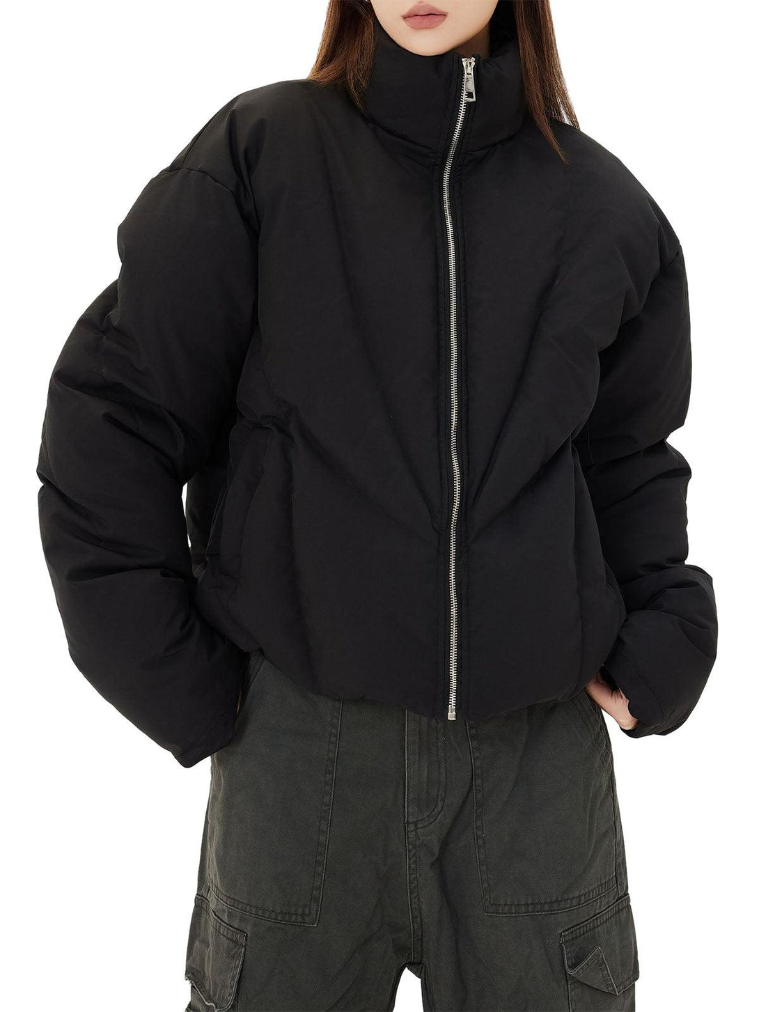 Model in black stand collar puffer jacket by TALISHKO, adding a chic touch to casual wear.