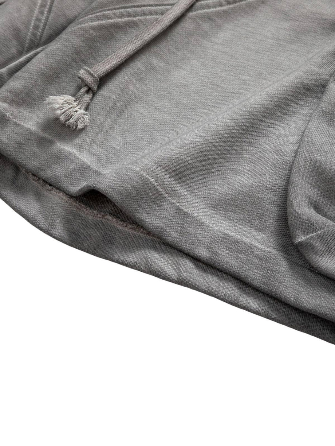 Detailed fabric and stitching of TALISHKO's velour cargo shorts, showcasing soft texture.