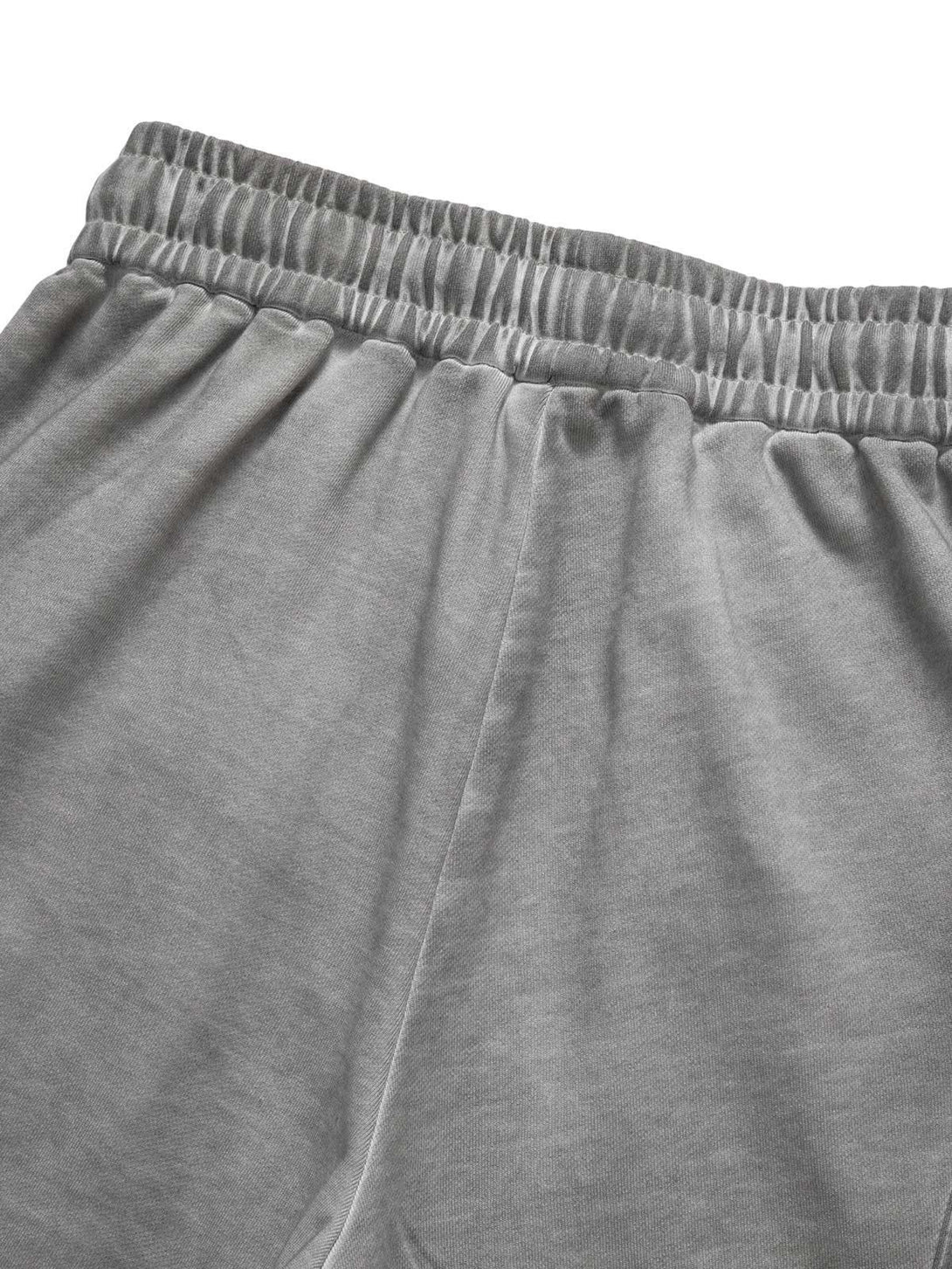 Elastic waistband detail of gray velour cargo shorts by TALISHKO, highlighting comfort and style.