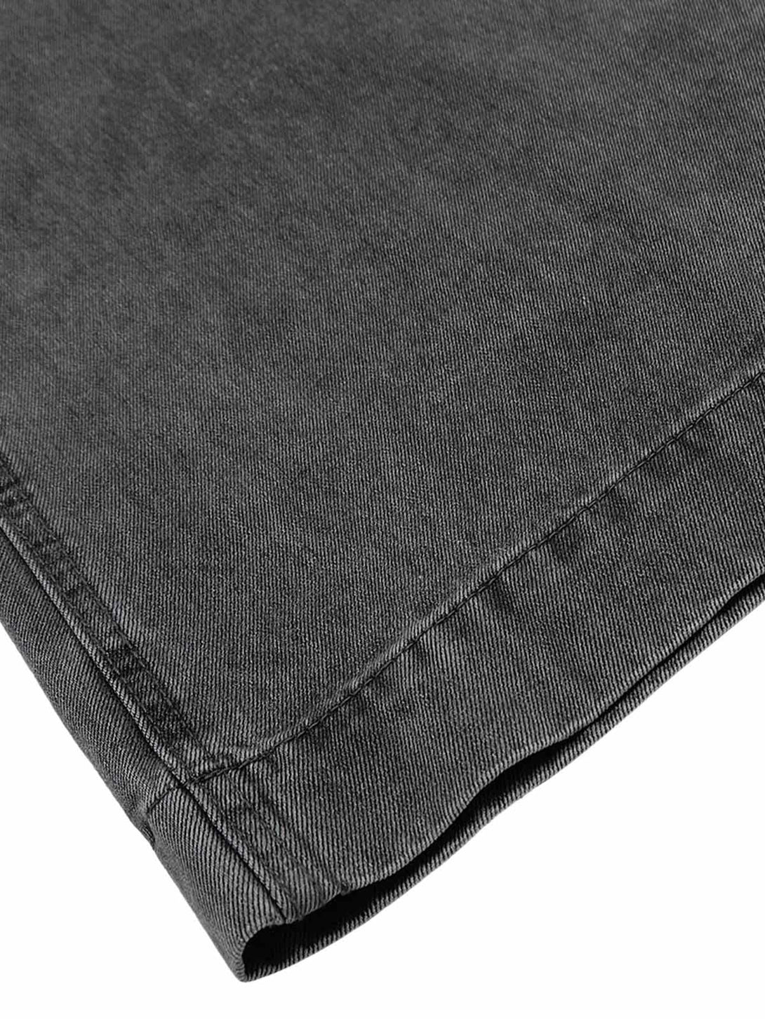 "Texture and stitching showcased in TALISHKO's classic washed drawstring baggy jeans."