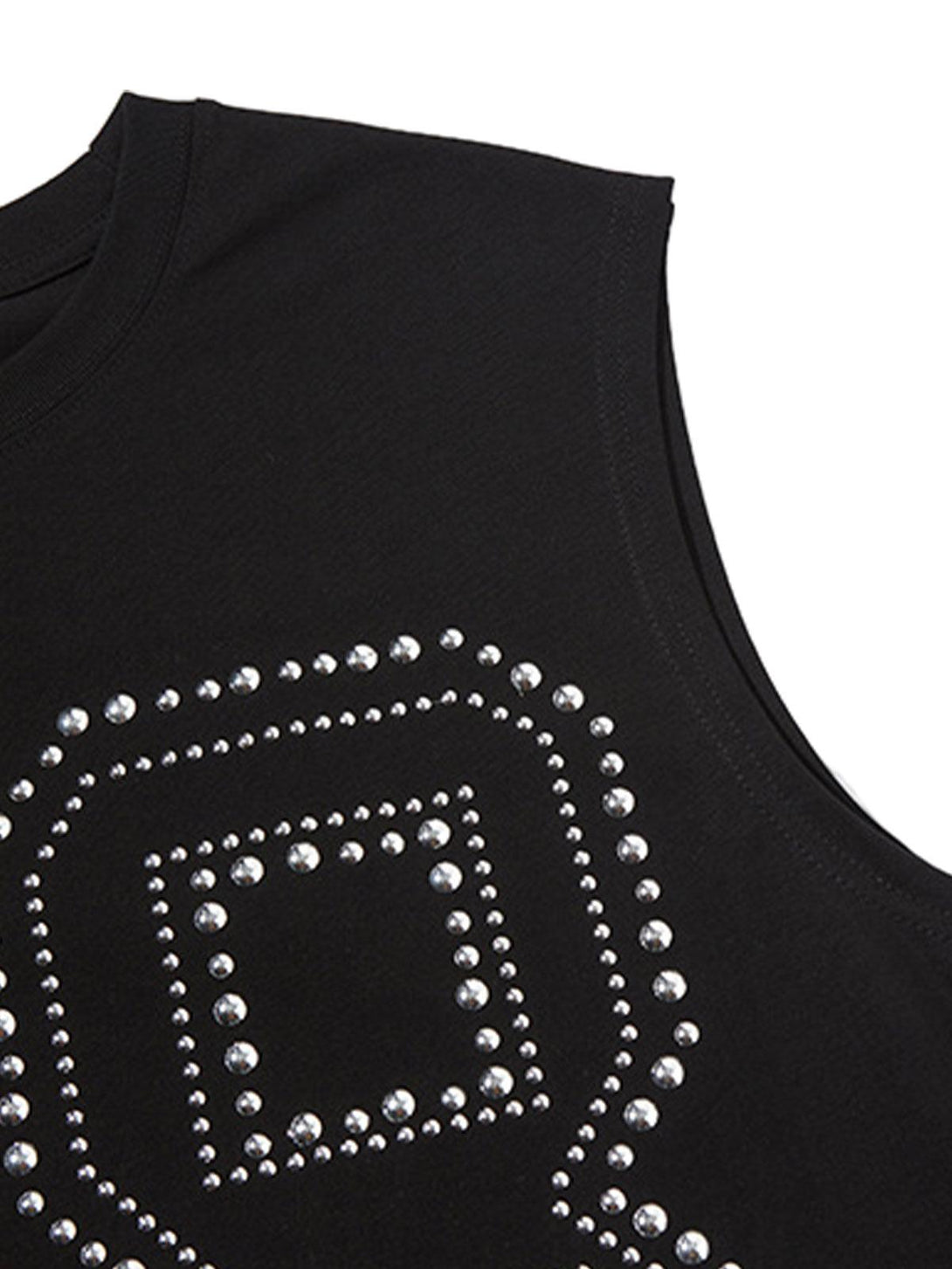 Intricate look at TALISHKO's black vest, featuring a stylish studded pattern detail.