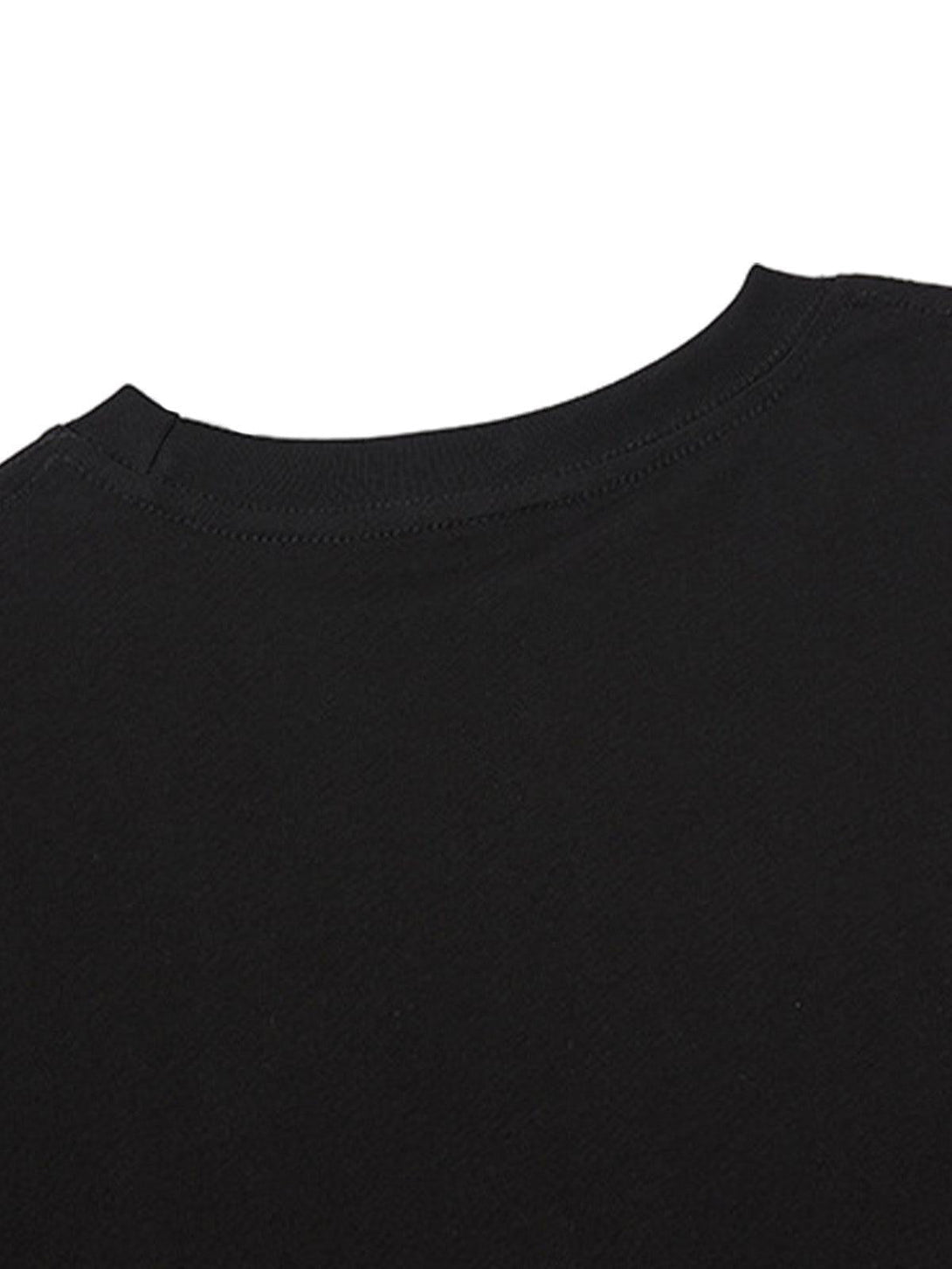 Detailed view of the TALISHKO vest's neckline, showcasing its sleek black fabric.