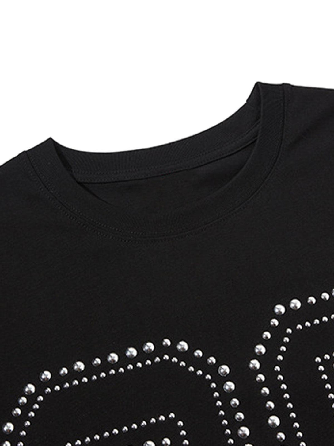 Zoomed-in view of TALISHKO vest, highlighting the elegant studded design on black fabric.