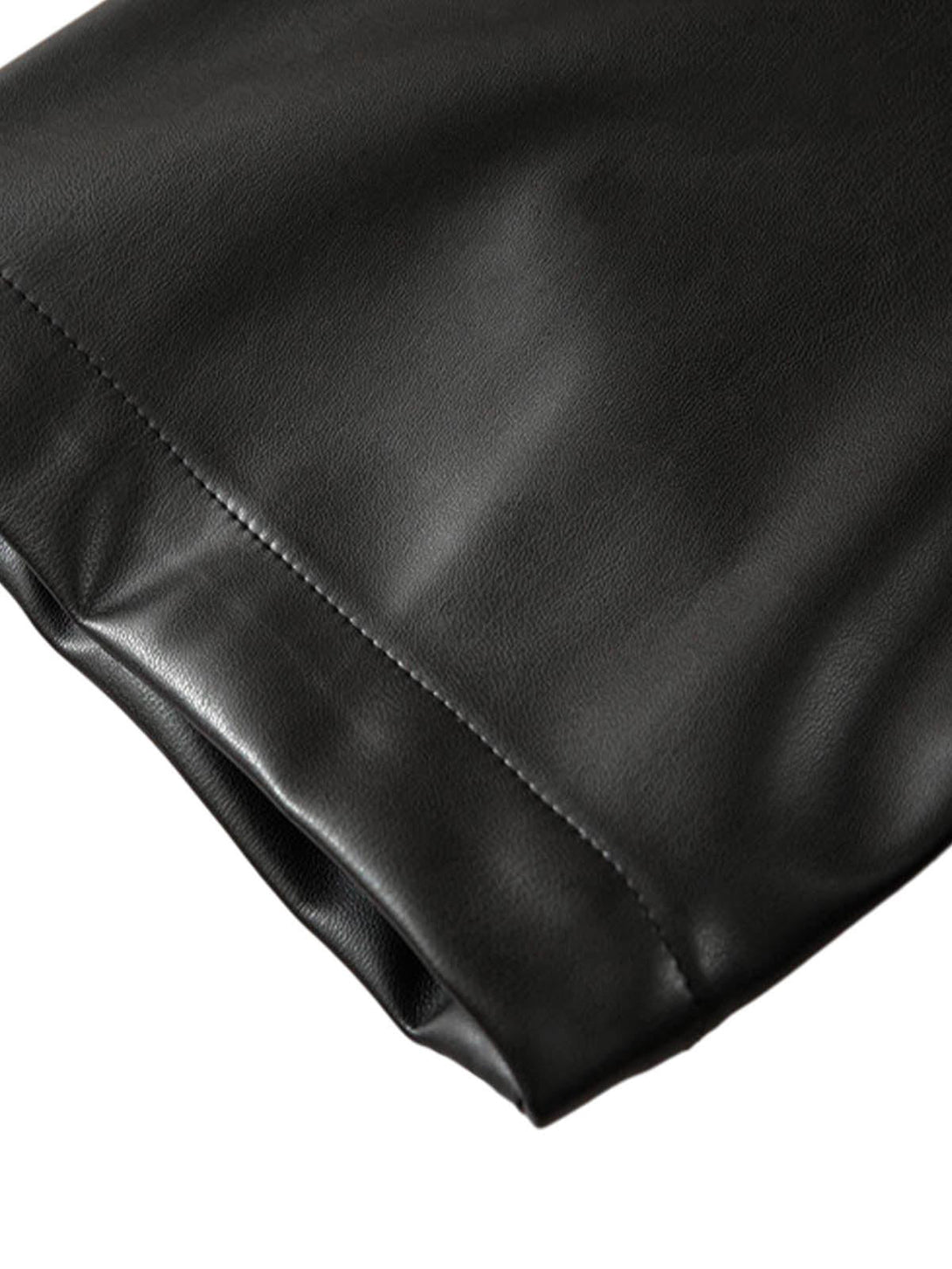 Smooth sleeve texture of TALISHKO's black PU leather shirt, highlighting sleek craftsmanship.