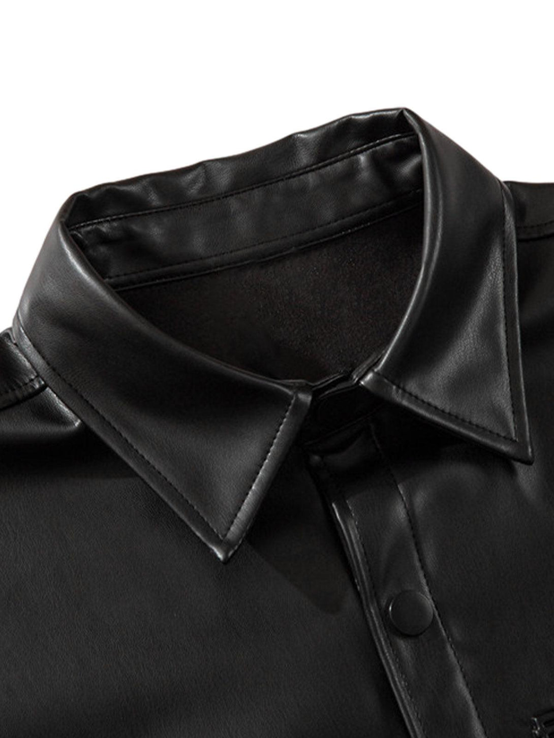 A close-up of the black PU leather shirt collar by TALISHKO, highlighting sleek design details.