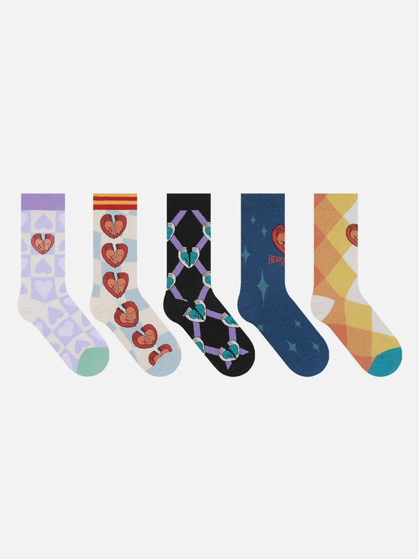 Colorful socks by TALISHKO featuring heart and geometric patterns, perfect for adding flair.