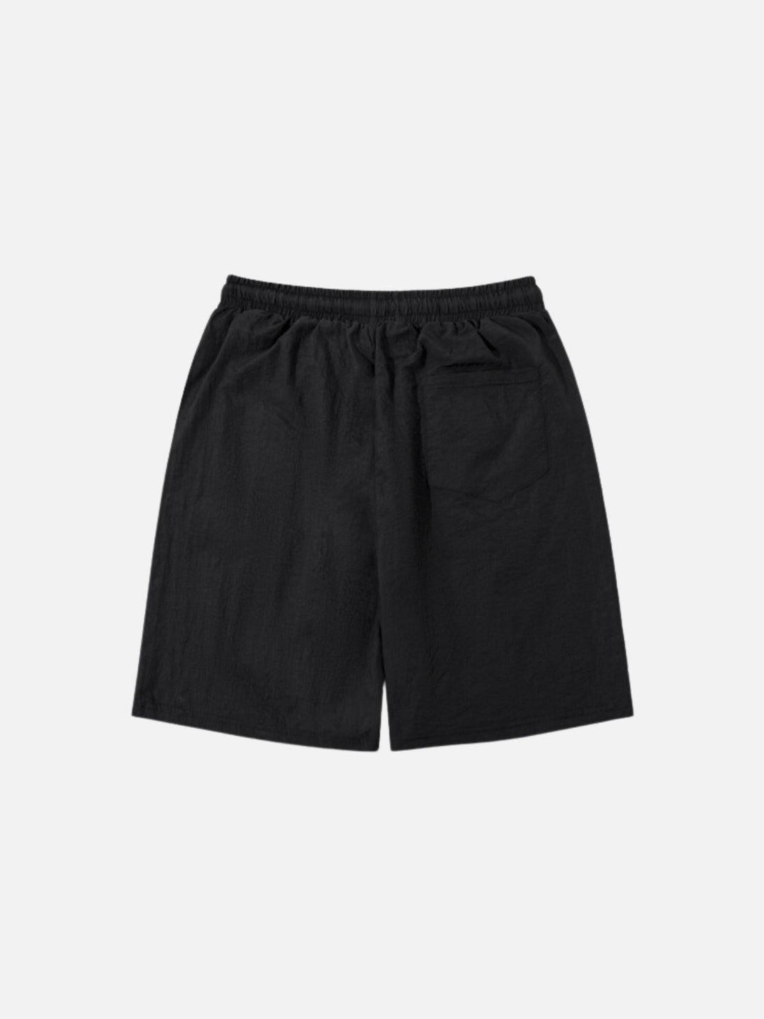 Back view of black shorts by TALISHKO with an elastic waistband and a single back pocket.