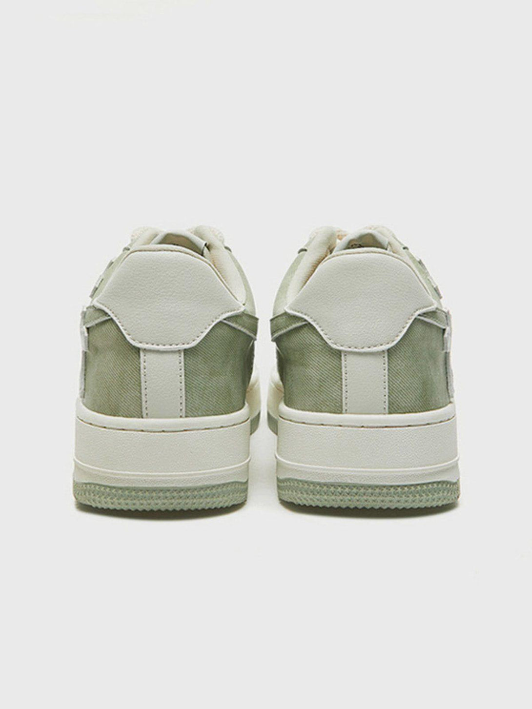 Back view of TALISHKO casual shoes, featuring a stylish green and white colorblock design.