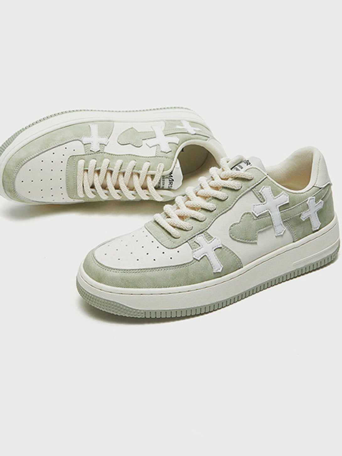 TALISHKO casual shoes with cross and heart detail, highlighting a stylish colorblock design.