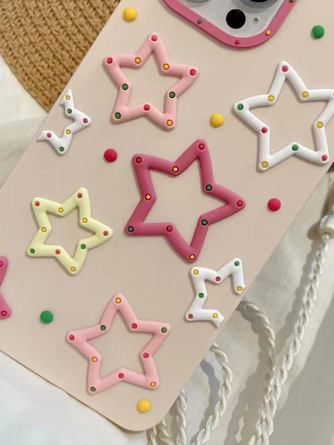 TALISHKO phone case adorned with vibrant 3D star patterns, adding a cheerful flair.