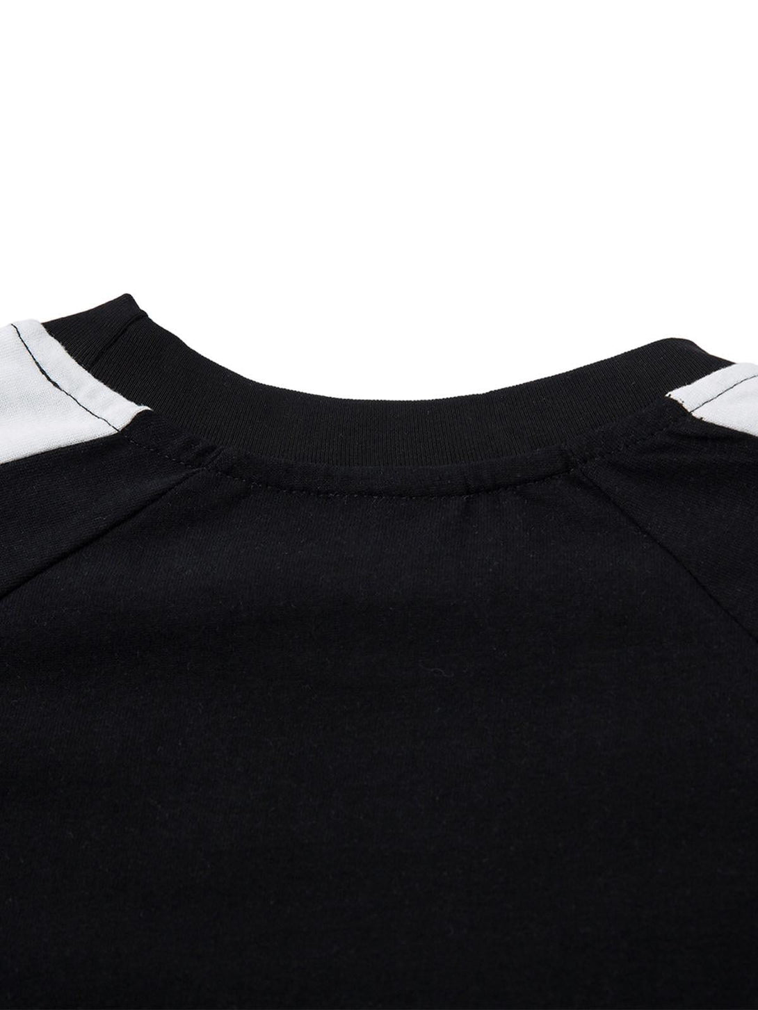 Detailed fabric and stitching at the neckline of the TALISHKO motorcycle print T-shirt.