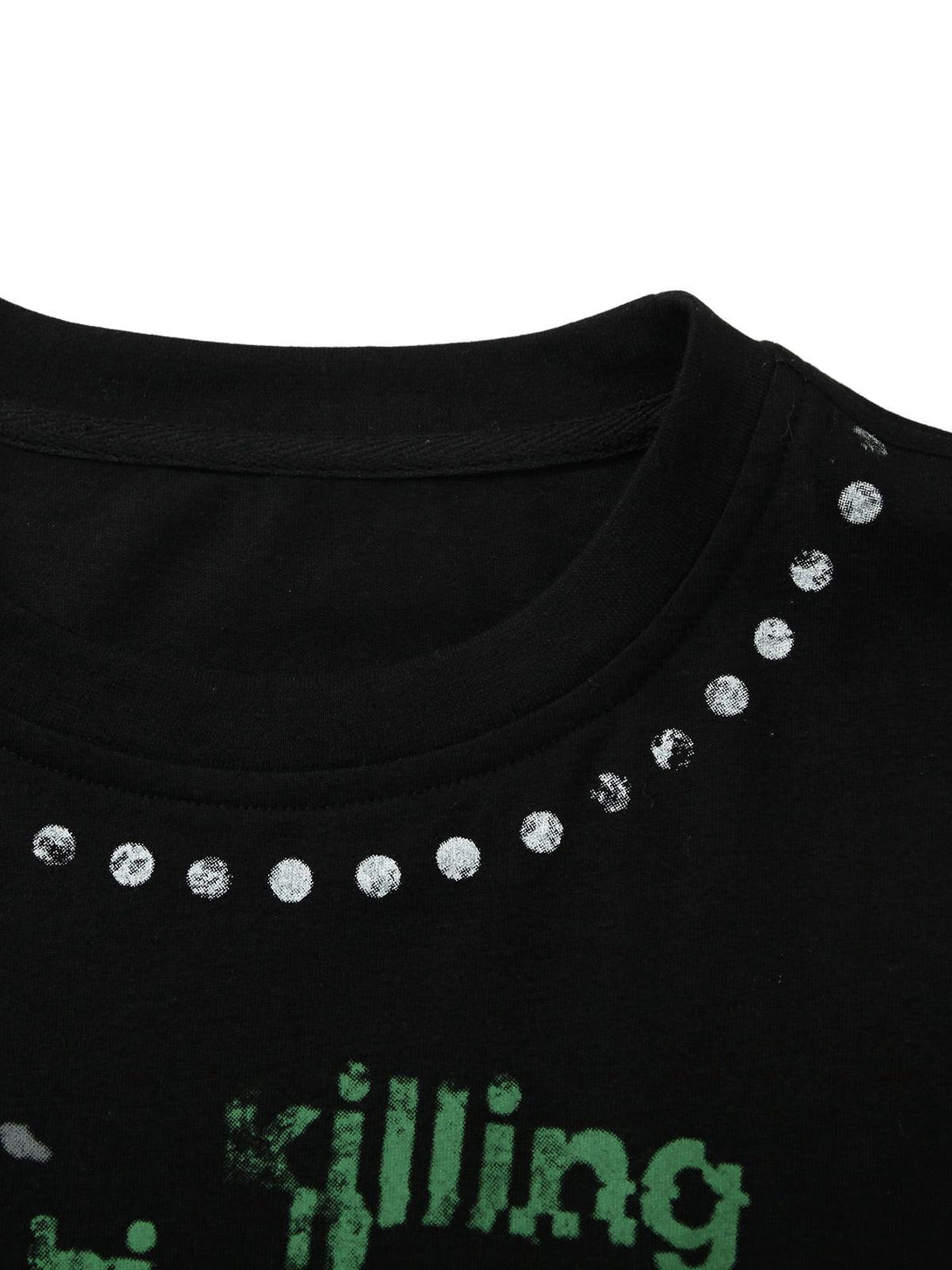 Intricate look at a TALISHKO T-shirt neckline, showcasing bold print and contrast details.