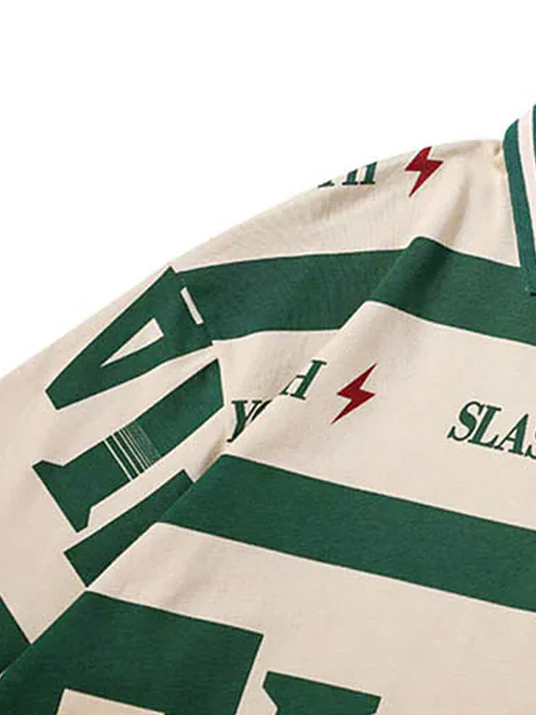 A detailed view of TALISHKO's contrast polo shirt, featuring striking graphic elements.