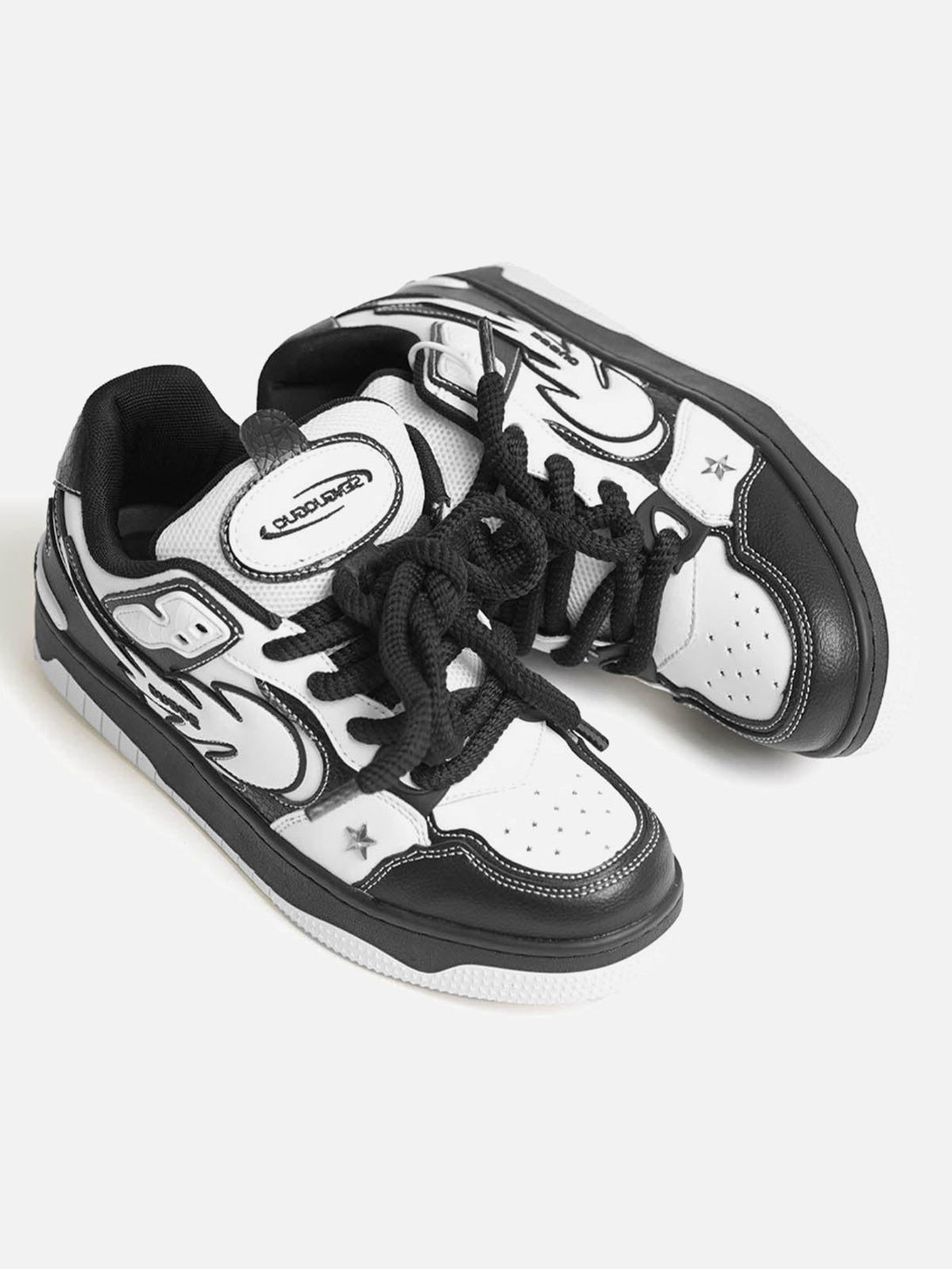 TALISHKO sneakers featuring a black and white contrast with star details, perfect for streetwear.