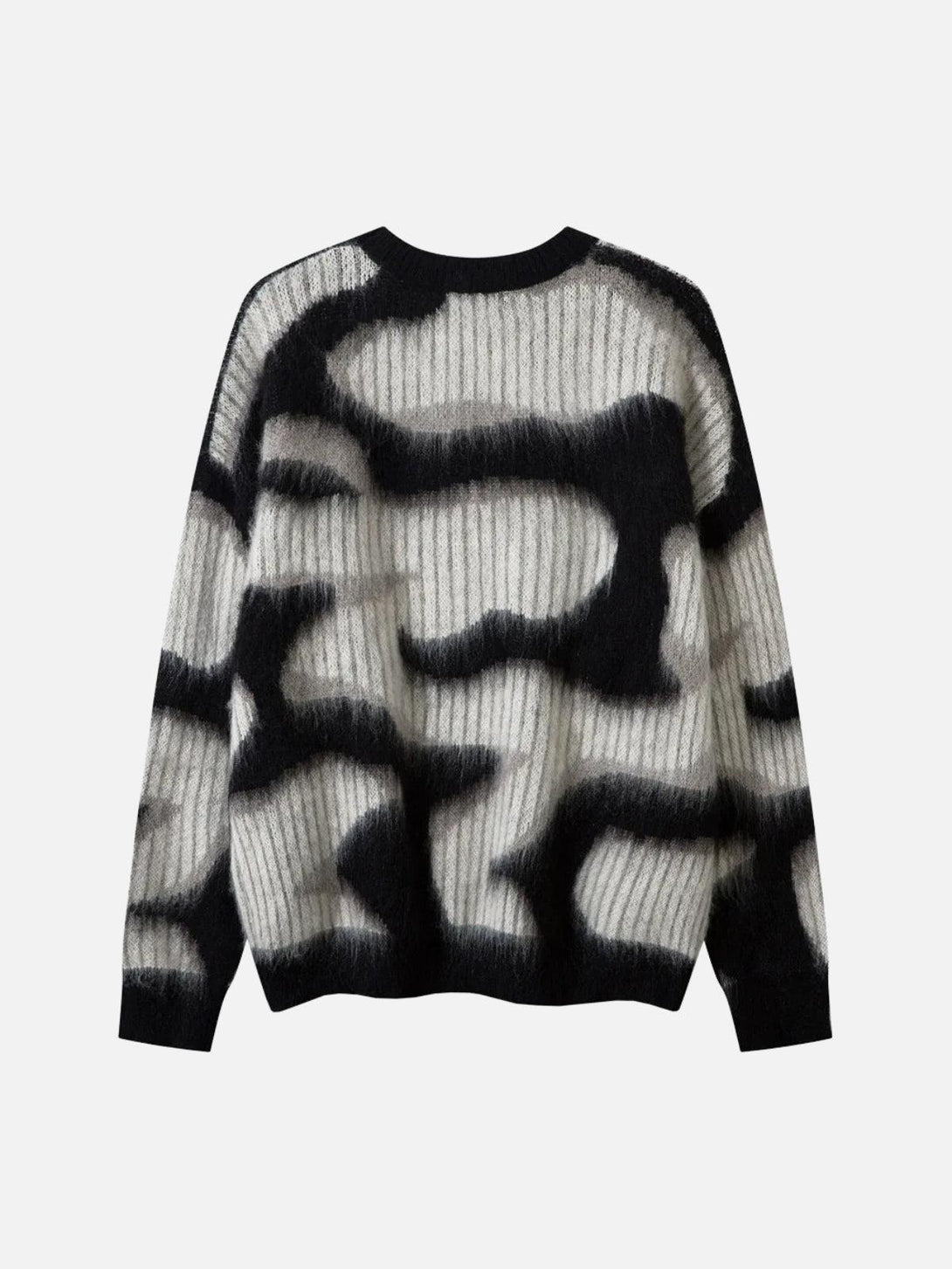 Back view of a mohair sweater by TALISHKO, featuring striking abstract patterns in black and white.