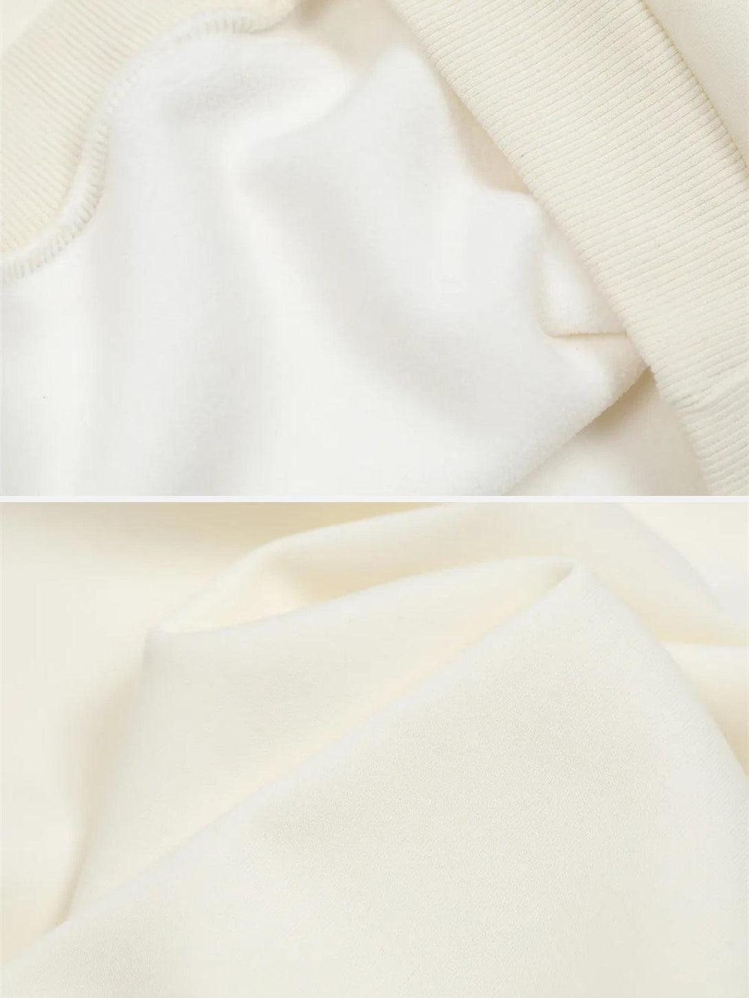 Zoomed-in texture of TALISHKO sweatshirt showcasing soft fabric and ribbed details.