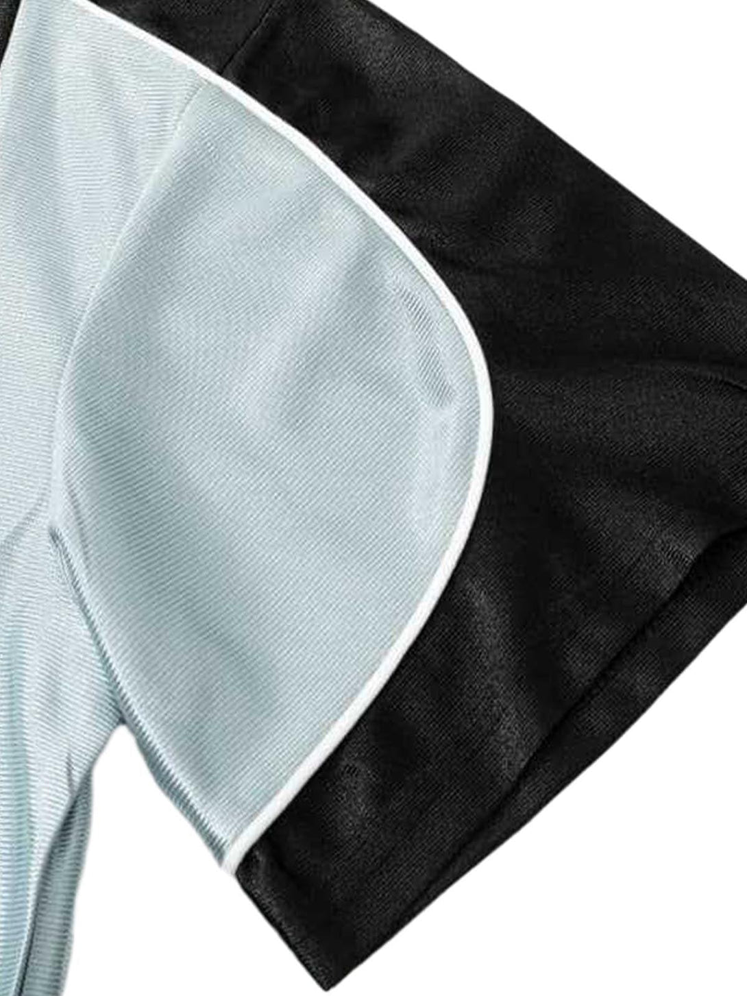 Detailed fabric and stitching of a jersey T-shirt with contrast design by TALISHKO.