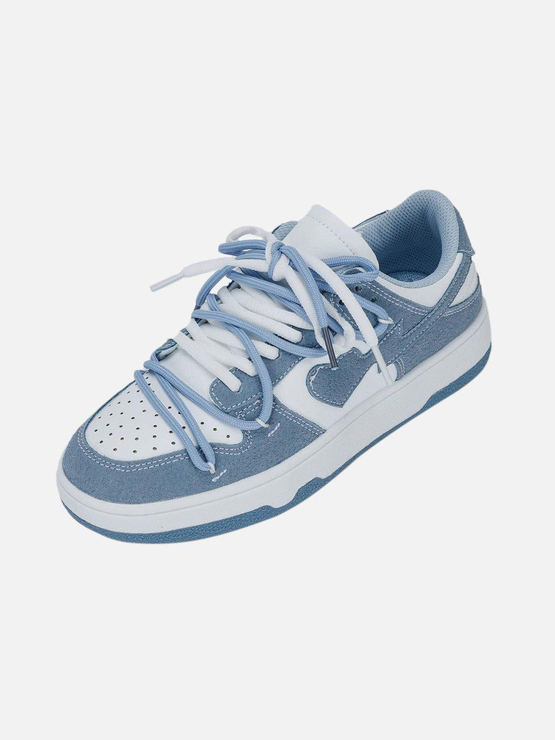 A close-up of blue and white sneakers by TALISHKO, showcasing a detailed lace design.