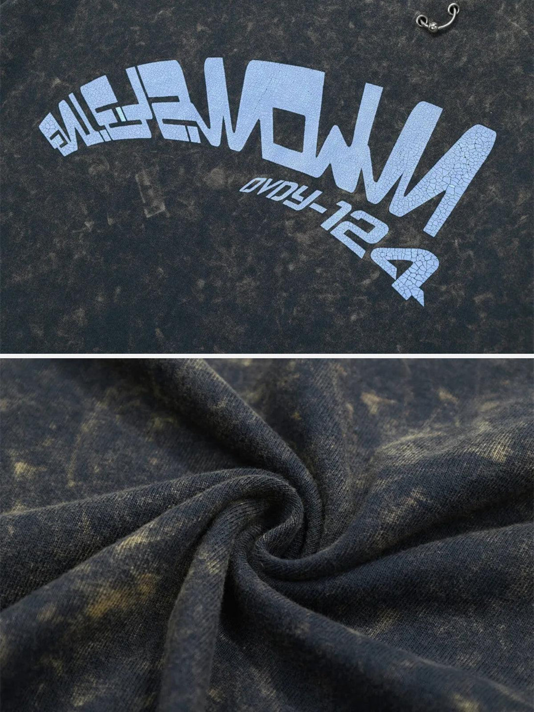 Close-up of TALISHKO tee's crack letter print and distressed fabric texture.