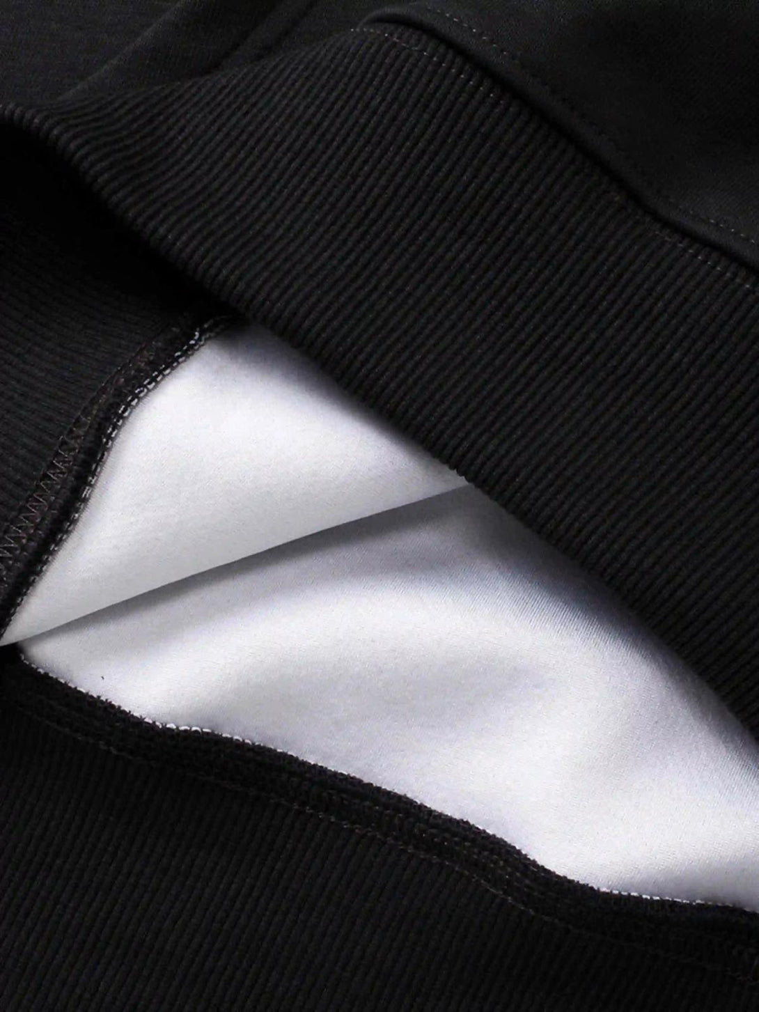 Detailed fabric and stitching of a TALISHKO hoodie, highlighting its quality craftsmanship.