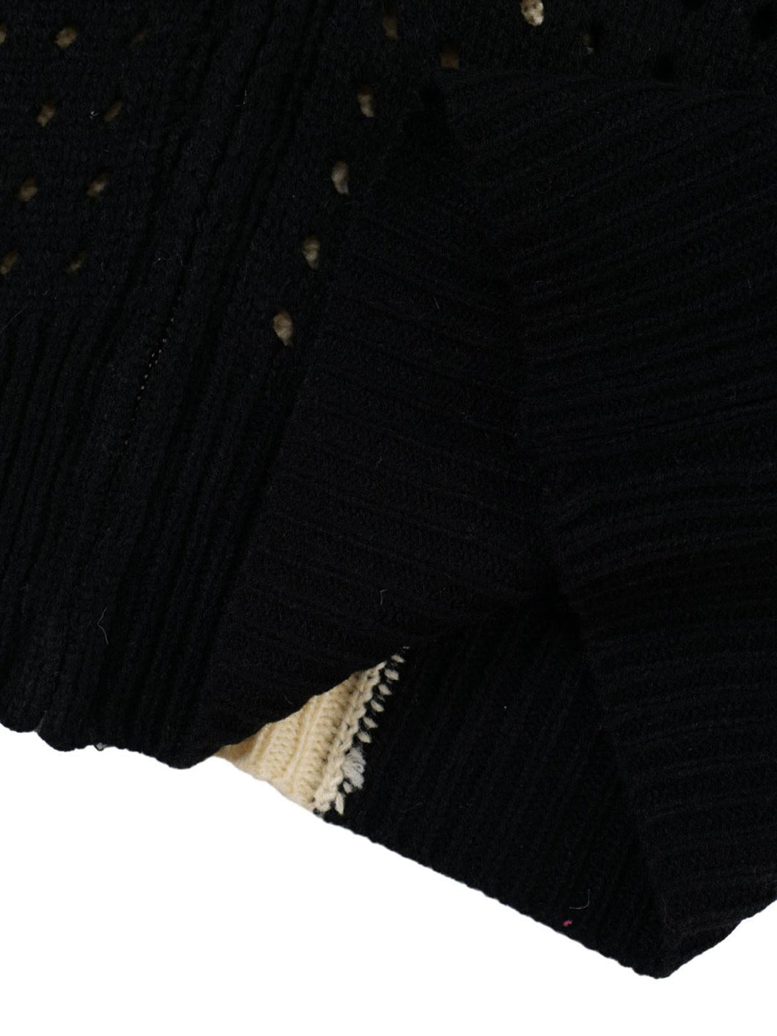 Detailed fabric and stitching of TALISHKO's hooded jacket, featuring cross jacquard texture.
