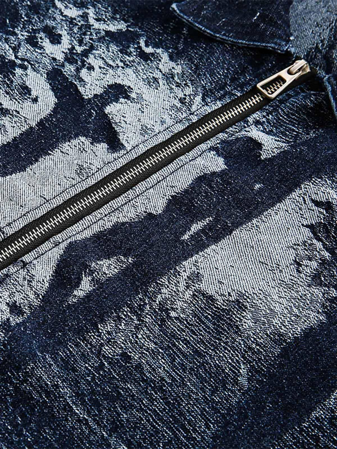 Focusing on the detailed jacquard texture of a TALISHKO denim jacket with a zipper accent.