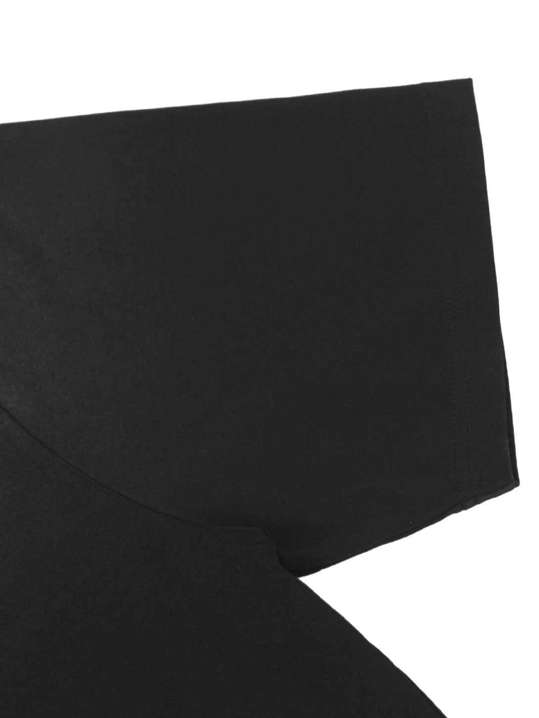 Detailed fabric and stitching close-up of a TALISHKO black T-shirt sleeve.