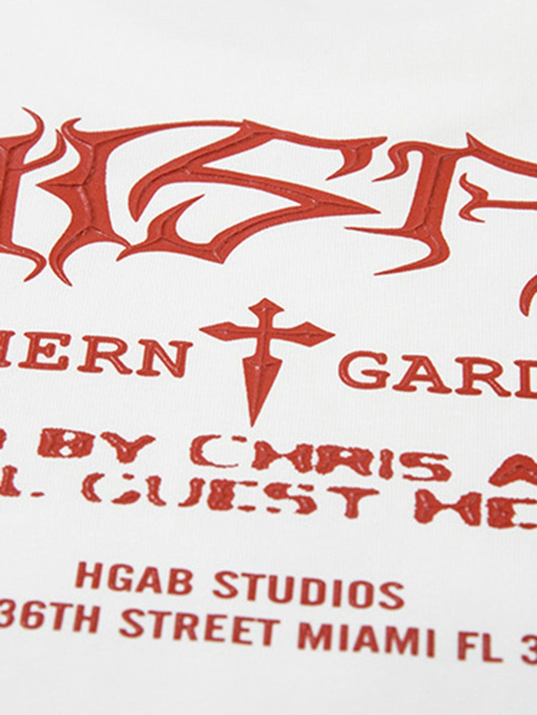 Intricate look at bold red text design on TALISHKO hip-hop T-shirt, highlighting graphic details.