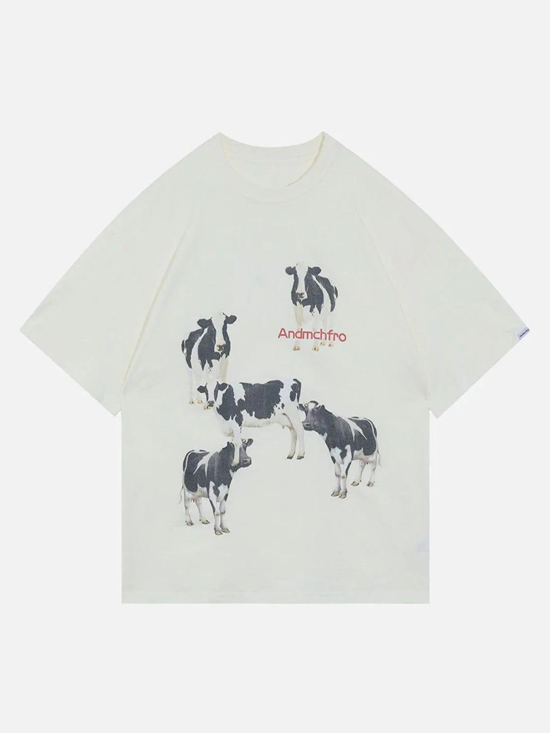 White cotton tee with cow print by TALISHKO, showcasing a playful and relaxed summer style.