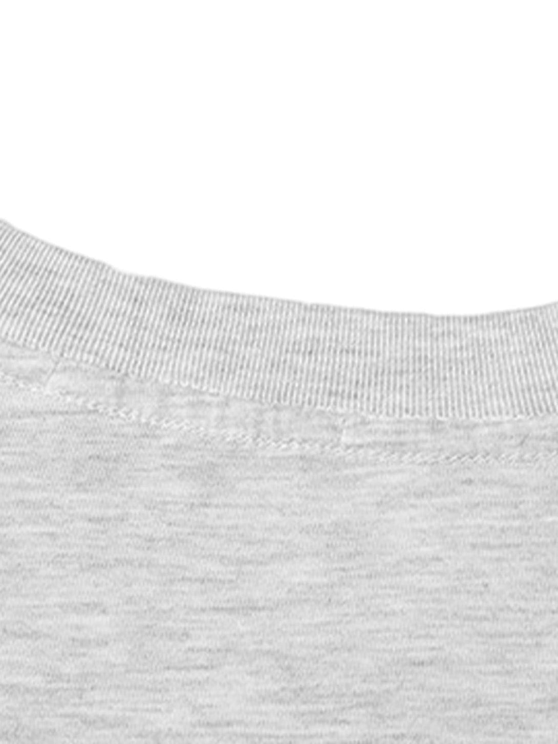 Detailed fabric and stitching on a gray Dalmatian graphic T-shirt by TALISHKO.