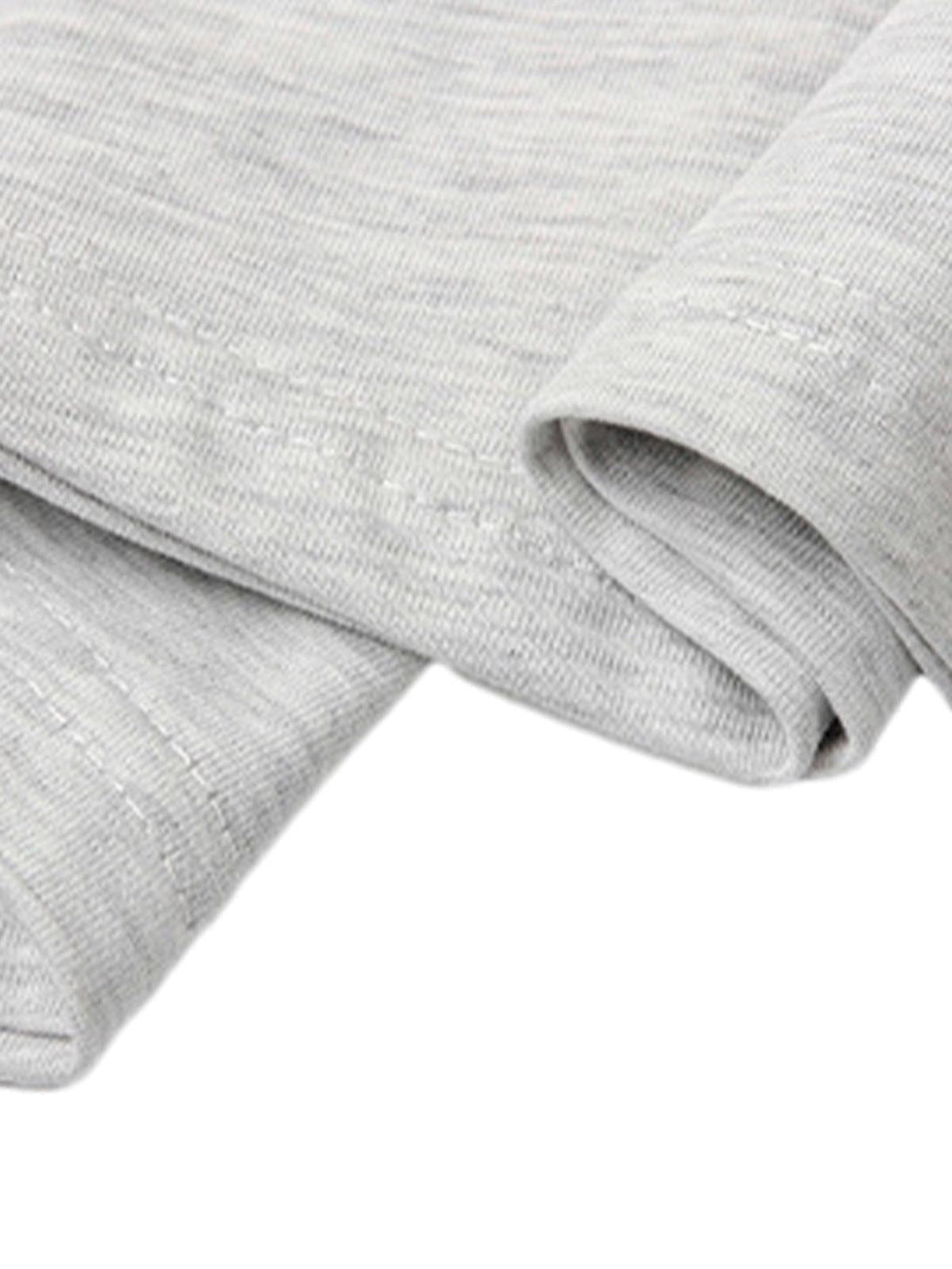 Detailed fabric and stitching on a light gray T-shirt by TALISHKO, perfect for casual style.