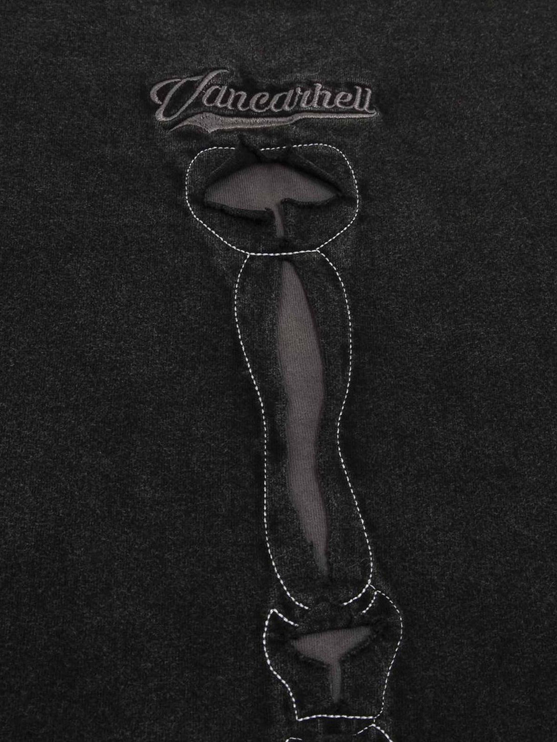 Intricate design detail from TALISHKO's dark washed T-shirt, highlighting unique stitching.