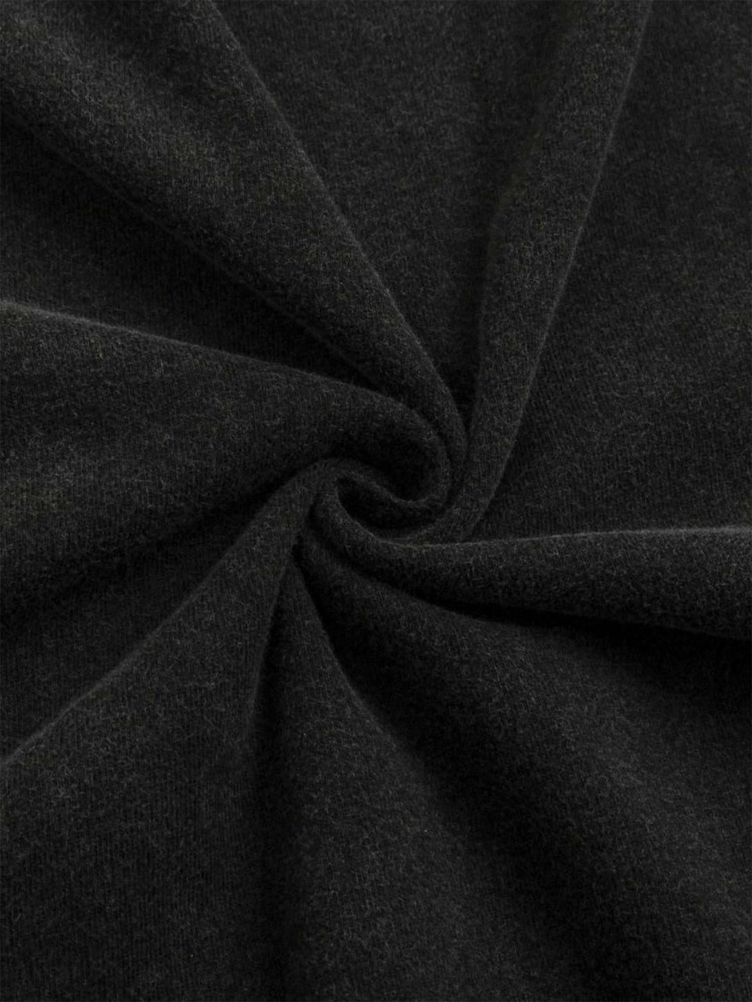Detailed fabric and texture of TALISHKO's dark washed T-shirt, perfect for casual looks.
