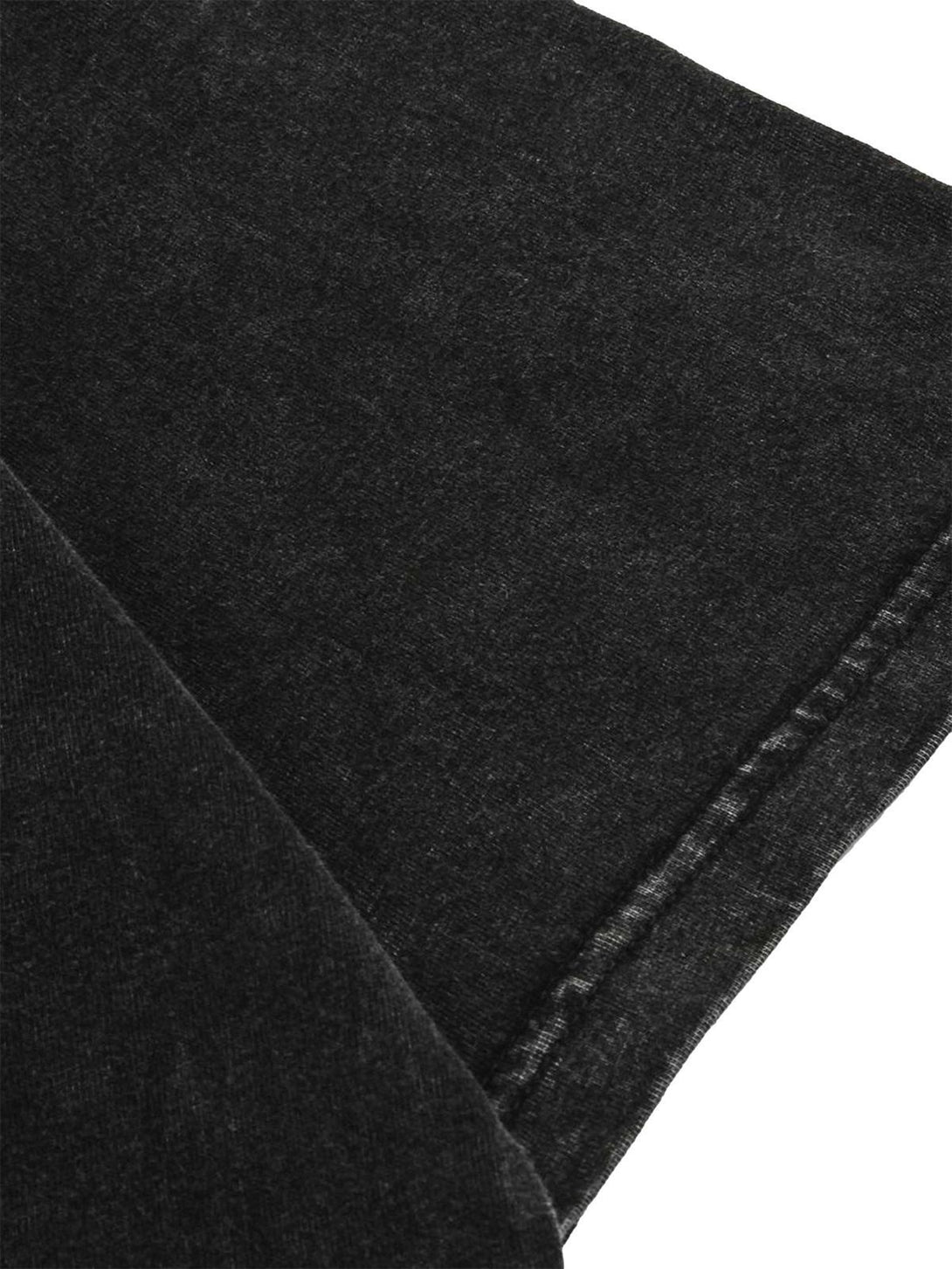 "Zoomed-in texture of TALISHKO's dark washed T-shirt, highlighting the soft fabric detail."