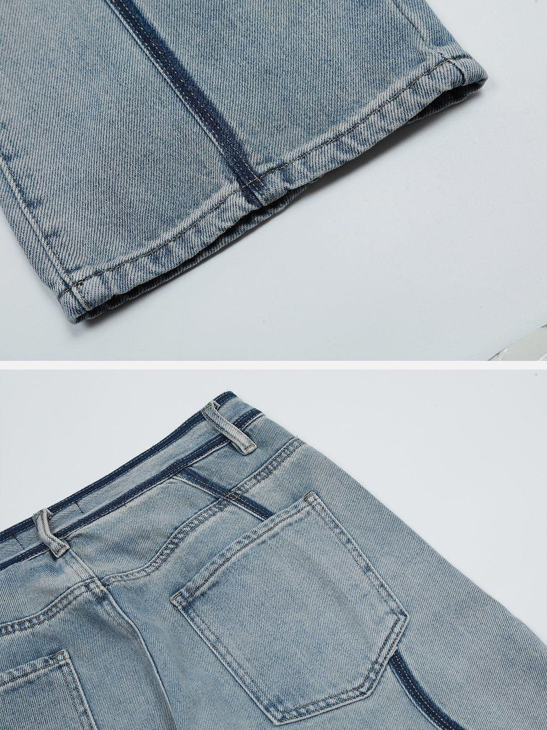 Intricate look at TALISHKO's patchwork jeans, highlighting detailed stitching and denim texture.
