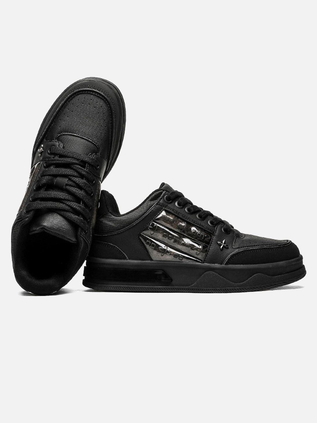 Sleek dark skate shoes by TALISHKO, featuring embroidered details and a modern aesthetic.