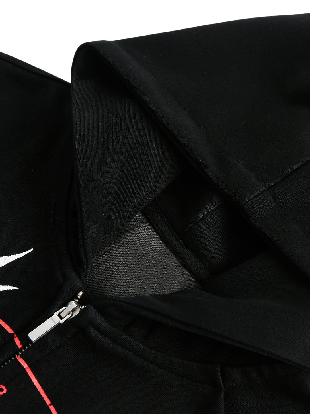 A detailed look at the black zip-up hoodie by TALISHKO, highlighting the hood and zipper design.