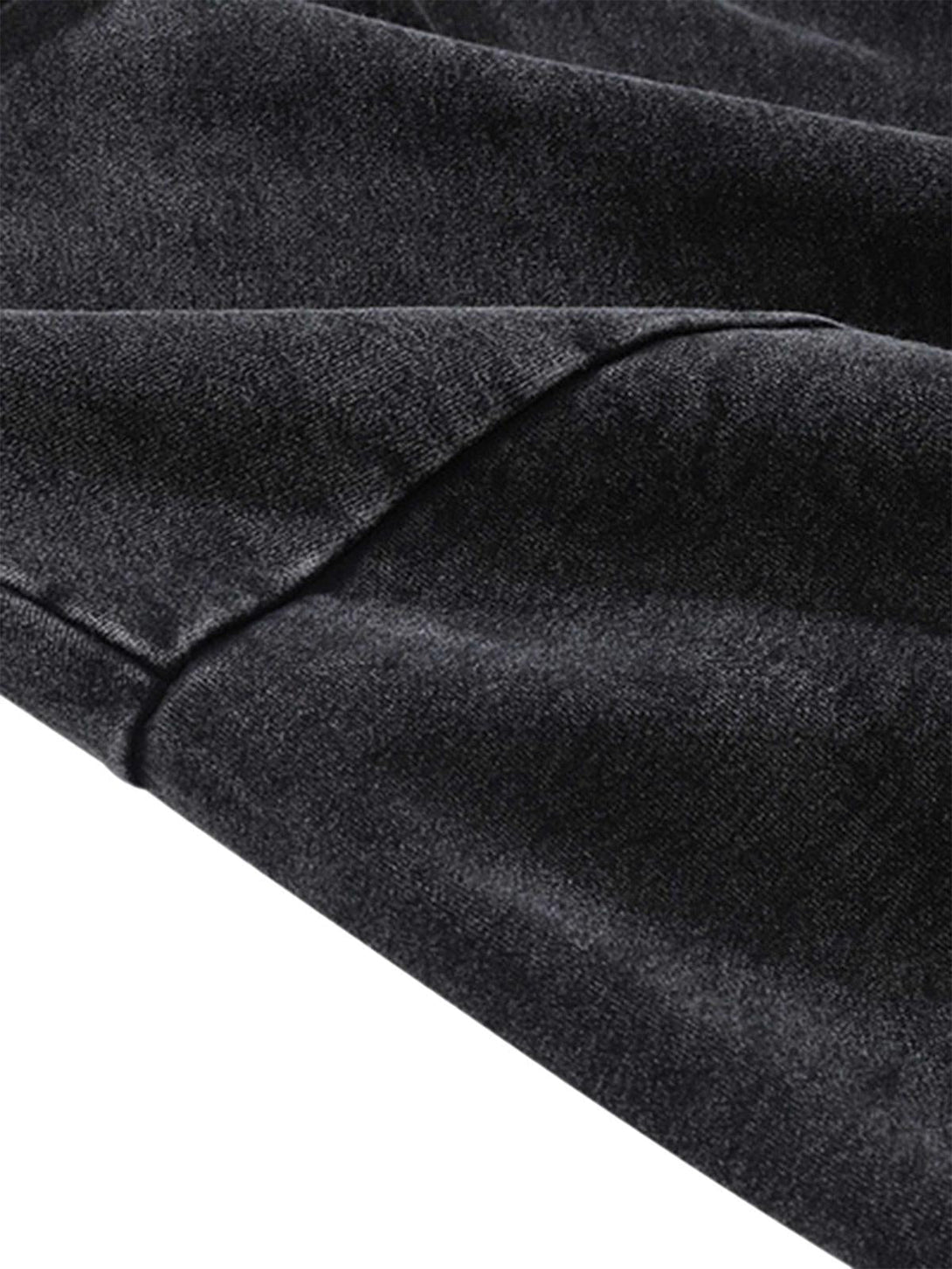 Zoomed-in texture of the TALISHKO Doberman hoodie, showcasing its dark, soft fabric.