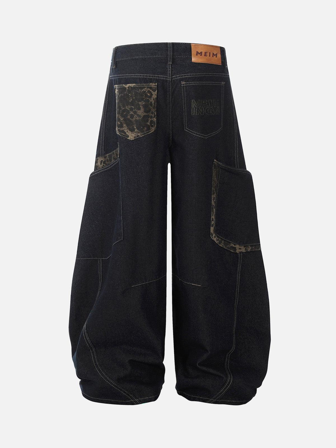 Back view of TALISHKO's baggy barrel jeans featuring distinctive cheetah print accents.