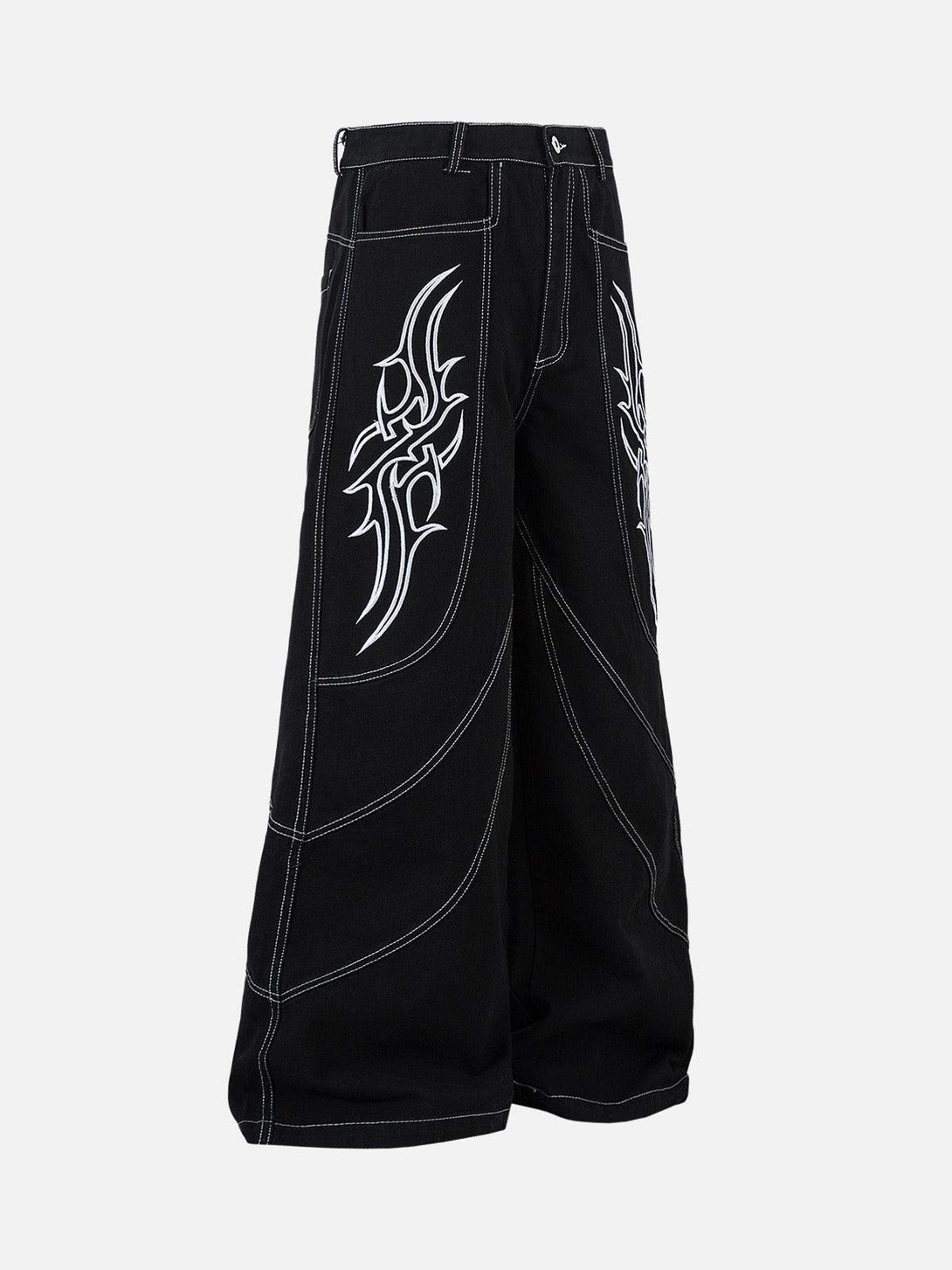 Side view of TALISHKO's baggy jeans featuring striking contrast embroidery, ideal for street fashion.