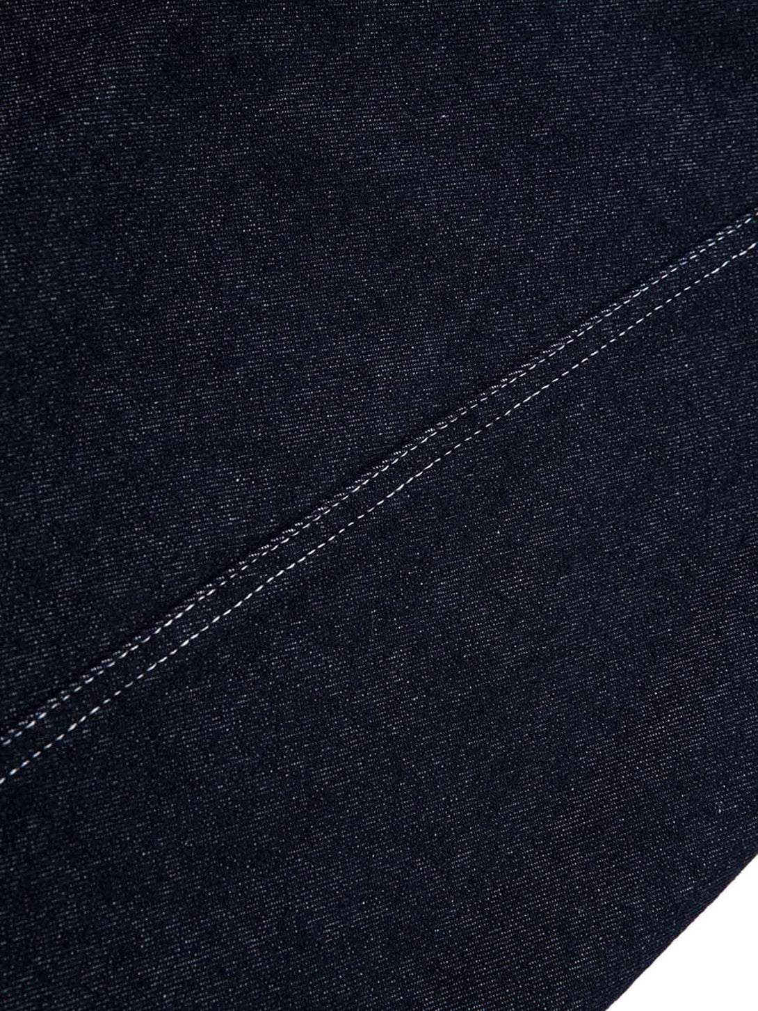 Intricate look at TALISHKO barrel jeans, emphasizing the detailed contrast stitching.