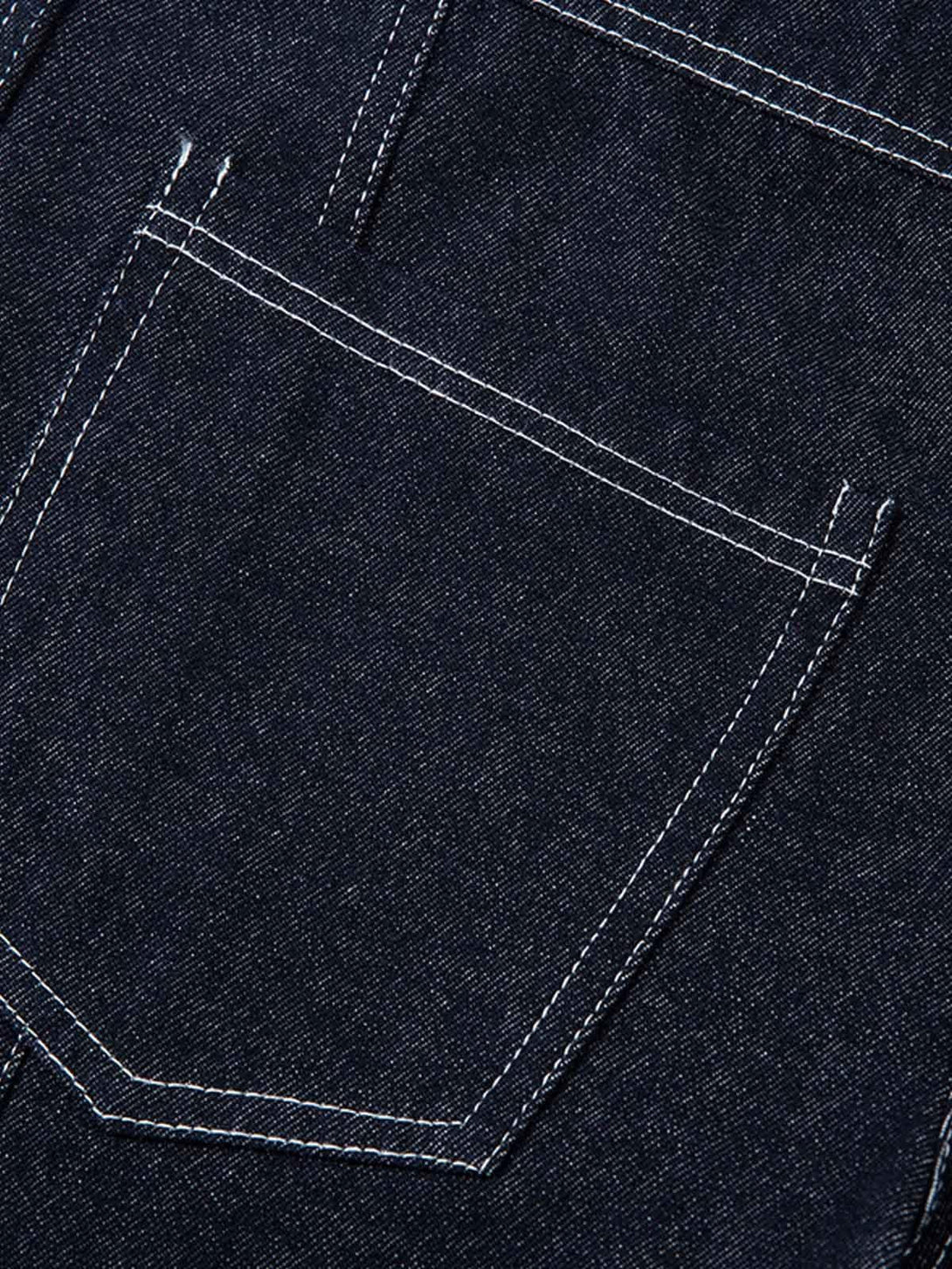 Zoomed-in texture of TALISHKO barrel jeans, showcasing intricate contrast stitching detail.