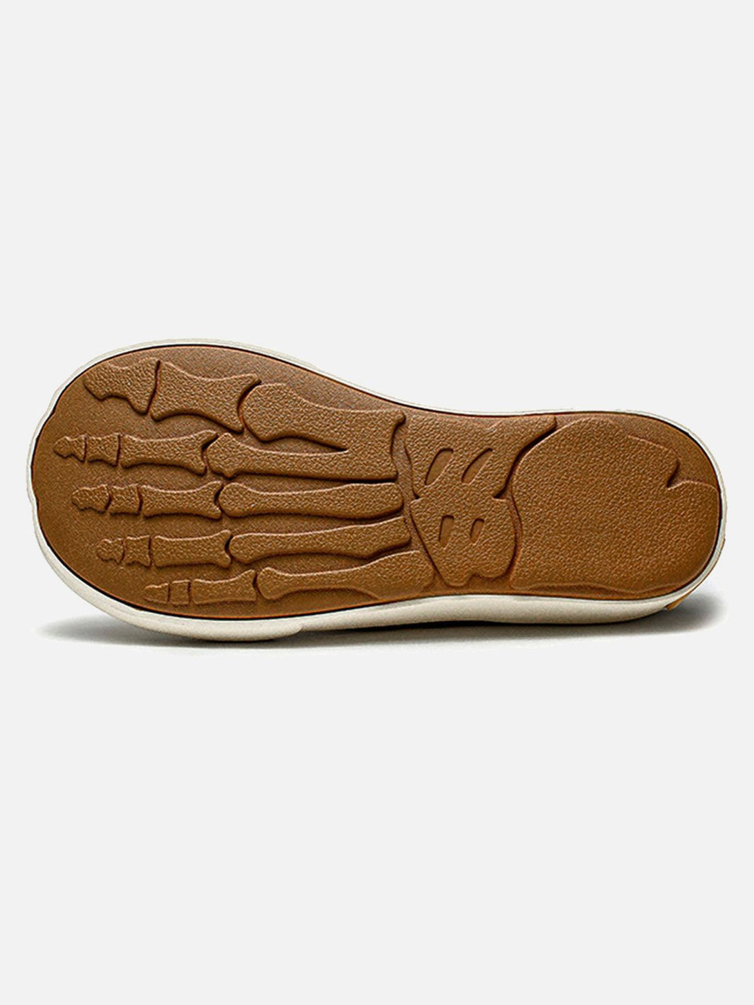 Intricate sole design of TALISHKO's casual shoes, featuring unique skeletal pattern detailing.