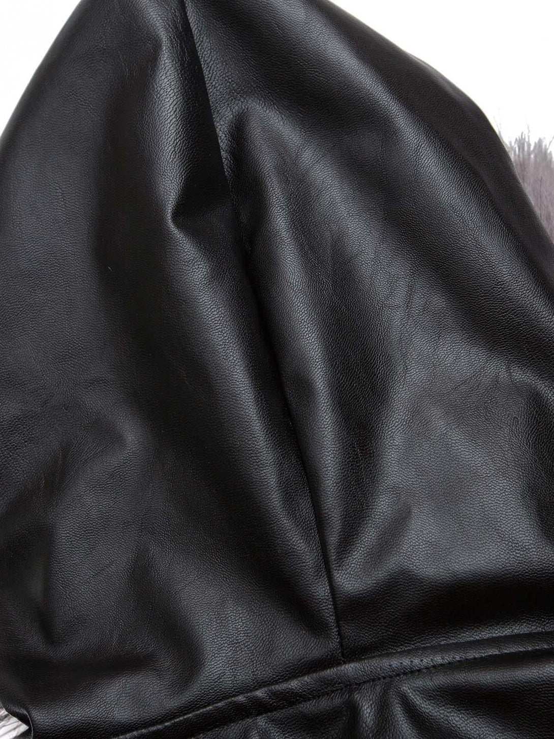 A close-up of the sleek PU leather hood from a TALISHKO jacket, showcasing fine texture.