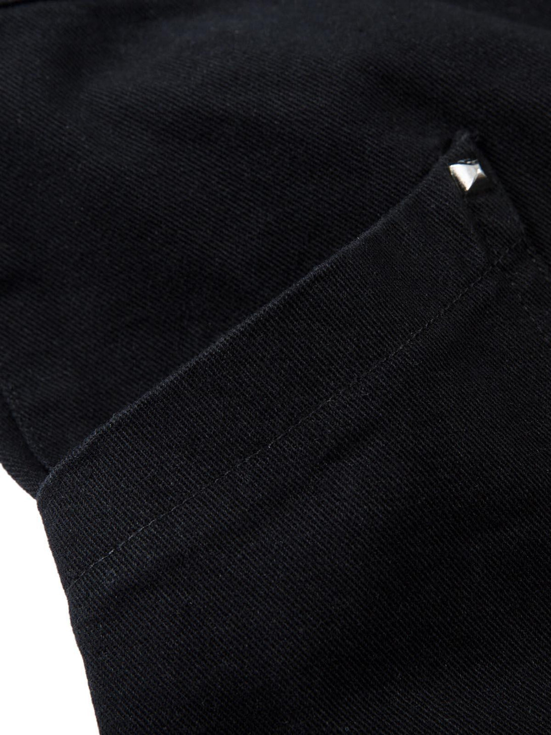 Detailed fabric and stitching of TALISHKO's black deconstructed split rivet cargo jeans.