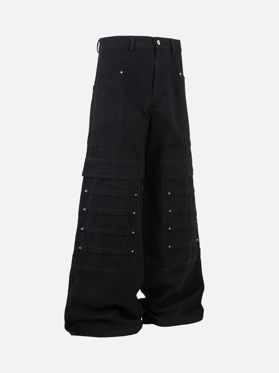 Side view of black deconstructed cargo jeans by TALISHKO, showcasing unique rivet details.